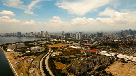 Antena-ciudad-con-rascacielos-y-edificios.-Filipinas,-Manila,-Makati