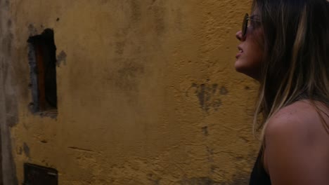 Young-Woman-Walking-and-Discovery-a-Small-Village-in-Italy