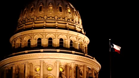 Lonestar-State-Flag-Waves-Austin-Capital-Building-Night