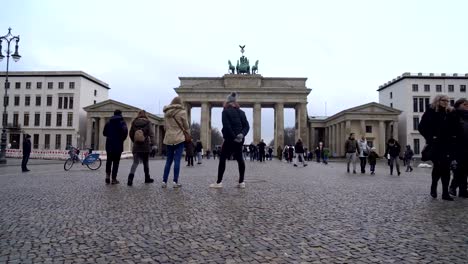 19.01.2018-Berlin,-Germany---People-Tourists-Crowd-Walk-On-Square-Near-Brandenburg-Gate.