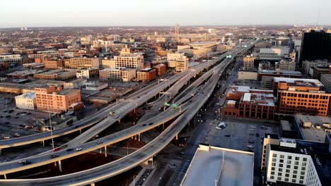 Aerial-view-of-american-city-at-dawn.-High-rise--buildings,-freeway,-bay.--Sunny-morning.-Milwaukee,-Wisconsin,-USA