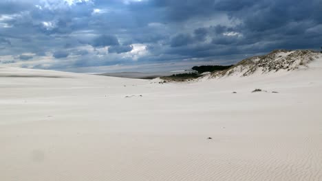 Sandy-Desert-and-Dark-Storm-Clouds