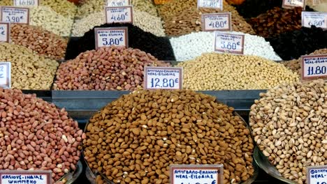 tilt-up-shot-of-various-nuts-and-fruits-at-athens-central-market