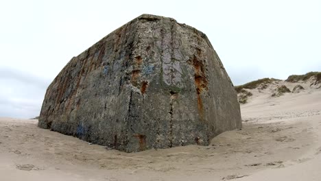 Ruin-of-concrete-Bunker,-Atlantic-Wall,-Second-World-War,-memorial,-North-Sea,-4K