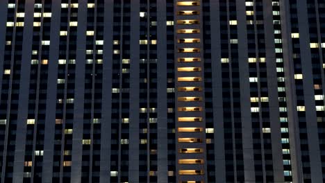 Illuminated-windows-of-hotel-,-time-lapse