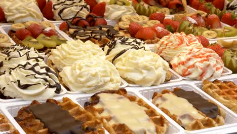 close-up-shot-of-fresh-belgian-waffles-on-display-at-a-bakery
