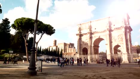 timelapse-on-a-windy-day-at-the-Arch-of-Constantine,-triumphal-arch-near-the-Colosseum-in-the-center-of-Rome