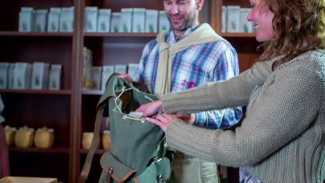 Pack-of-tea-is-put-in-the-backpack