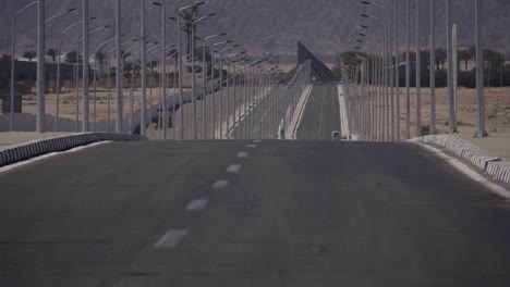 Lonely-road-near-the-desert-mountains