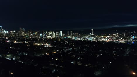 Seattle-Wa-City-Skyline-Lit-Up-at-Night-Aerial-Perspective