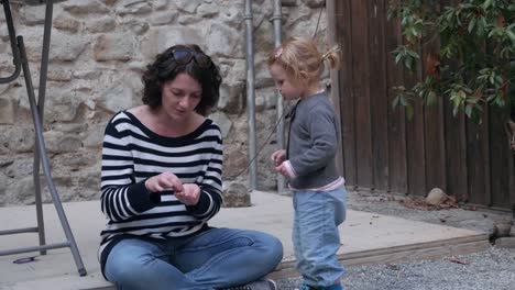 Mother-and-Toddler-Interacting-Outdoors