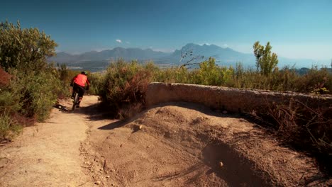 Mountain-bike-riding-on-dirt-road-showing-it's-tire-tread
