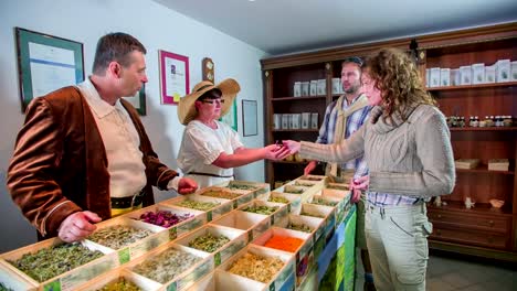 Man-asking-the-seller-about-the-domestic-herbs