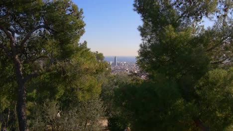 sun-light-barcelona-park-guell-agbar-tower-sea-panorama-4k-spain