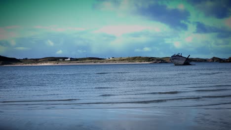 4k-Shot-of-Ship-Wreck-on-Irish-Coast-Beach