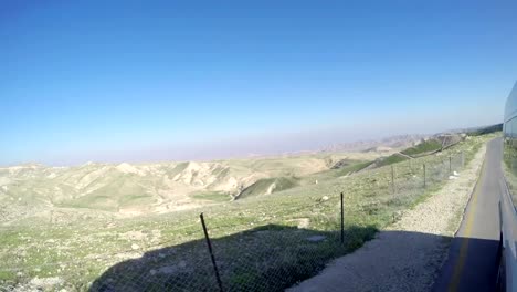 Drive-to-Winding-road-in-wadi-Sorek-in-Jerusalem-mountains,-pov