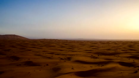 Desert-sand-dunes-ripples-during-sunrise-timelapse