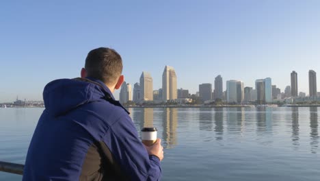 Man-drinking-coffe-at-morning-on-San-Diego-City