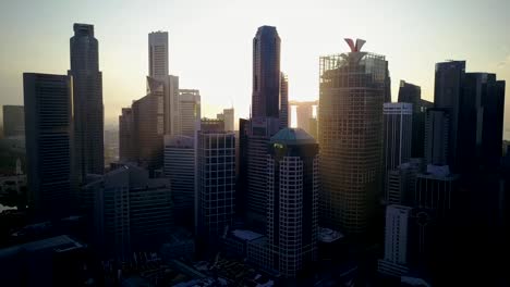 Beautiful-morning-drone-footage-of-Singapore-urban-skyline-at-central-business-district-with-marina-bay-background.