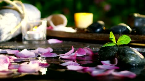 beautiful-water-and-candles-spa-and-wellness-composition-shoot-in-extreme-slow-motion.concept-of-relax-and-meditation.water