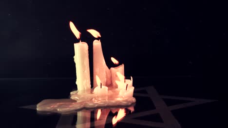 Six-burning-candles-and-the-Star-of-David,-rotation-360-degrees-against-a--background.