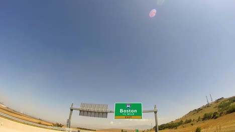 4K-Driving-on-Highway/interstate,--Exit-sign-of-the-City-Of-Boston,-Massachusetts