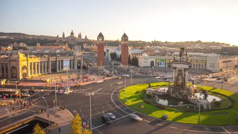 sunset-light-placa-de-espana-traffic-circle-4k-time-lapse-barcelona