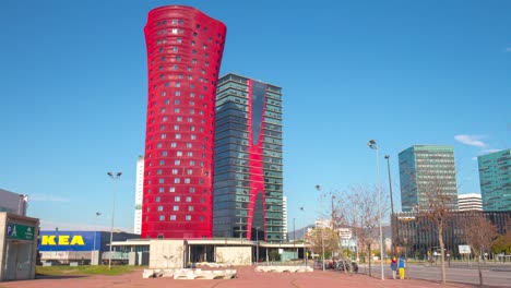 sun-light-barcelona-city-famous-red-tower-hotel-porta-fira-4k-time-lapse-spain