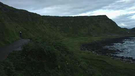 4k-Shot-of-Tourists-on-Giant's-Causeway,-Northern-Ireland