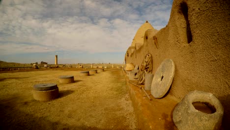 stone-rings-at-the-clay-old-wall-of-a-house-in-the-south-east-of-Turkey,-on-the-border-with-Syria