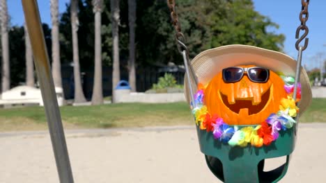 Happy-Halloween-pumpkin-on-the-beach-in-4K-Slow-motion-60fps