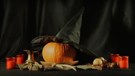 Ritual-candles-blown-out-and-smoking-on-table-with-witchcraft-objects