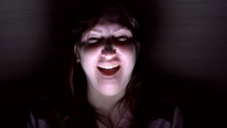 Young-horrible-girl-in-dark