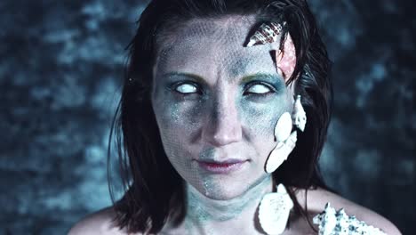 4k-Halloween-Shot-of-a-Horror-Woman-Mermaid-Opening-Whiteout-Eyes