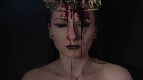 4k-shoot-of-a-horror-Halloween-model---Vampire-with-crown-and-blood-on-head