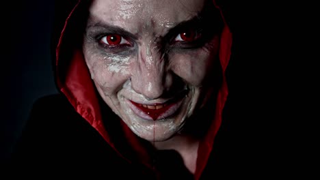 4k-shoot-of-a-horror-Halloween-model-with-evil-bloody-smile