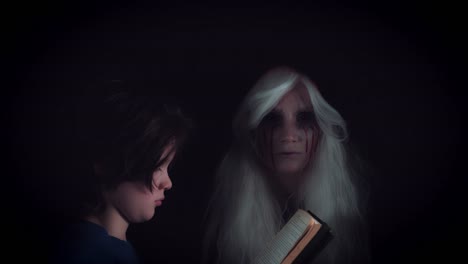 4K-Horror-Witch-Appears-from-dark-and-Child-Reading-Story-Book