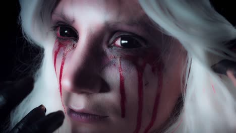 4K-Horror-Witch-Face-Close-up-with-Bloody-Tears