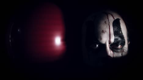 4k-Halloween-Horror-Clown-Man-With-Balloon-in-the-Dark