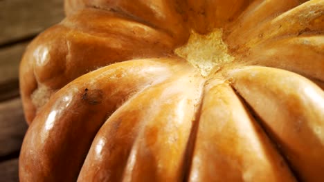 Halloween-pumpkin-on-a-wooden-table-4k