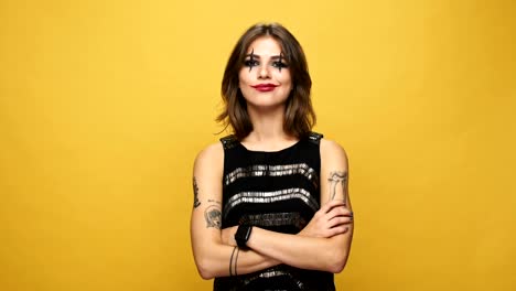 Confident-tricky-lady-with-dark-make-up-and-red-bright-lipstick-saying-yes-to-camera-isolated