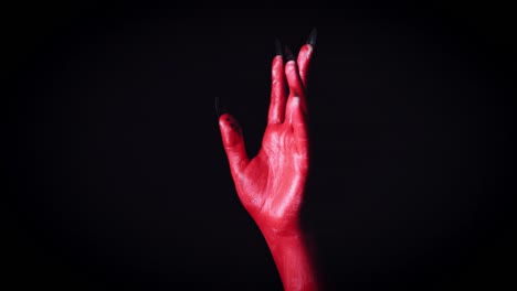 4k-Horror-Devil's-Hand-Showing-Middle-Finger