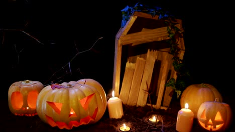 Cementerio-de-Halloween,-velas-y-gato-o-linterna