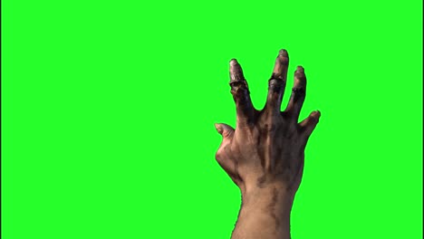 zombie-hand-on-a-green-background-on-Halloween