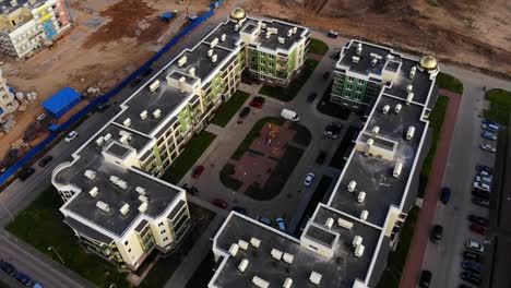 Aerial-panorama-on-modern-apartment-complex-and-construction-site.