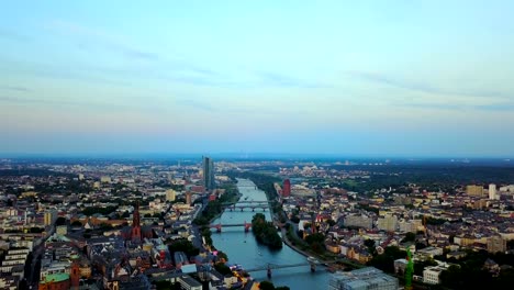 aerial-view-of--Frankfurt-city-with-river-and-skyscrapers-during-sunrise