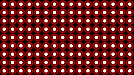 Lights-flashing-wall-round-bulbs-pattern-vertical-rotation-stage-red-background-vj-loop