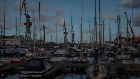 Timelapse-of-Marina-with-floating-boats-in-Wismar,-Germany-with-epic-clouds-during-sunny-weather