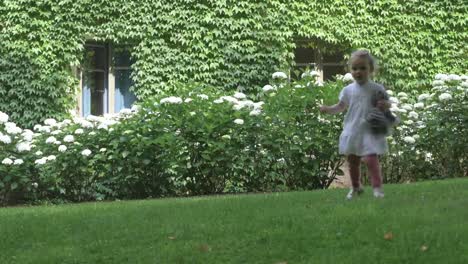 Child-Running-in-Lush-Backyard