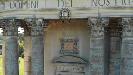 Facade-of-the-Old-Catholic-Church,-Stone-Statues-and-Colons